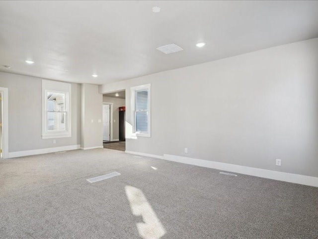 empty room featuring carpet flooring