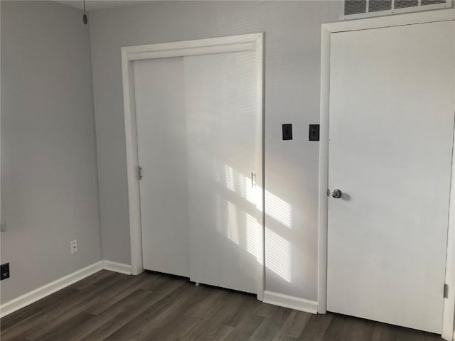 interior space with dark wood-type flooring