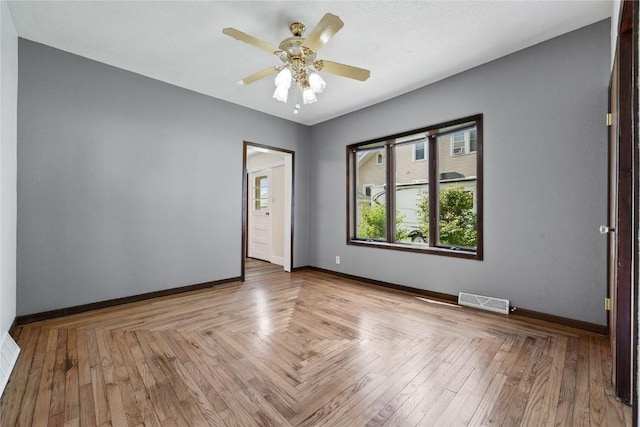 empty room featuring ceiling fan