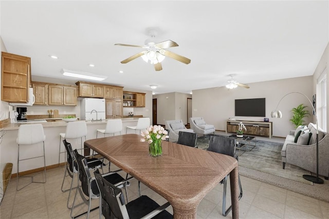 dining area featuring ceiling fan