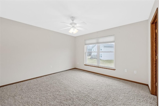 unfurnished bedroom with ceiling fan and carpet