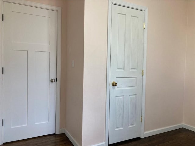 interior space with dark hardwood / wood-style flooring