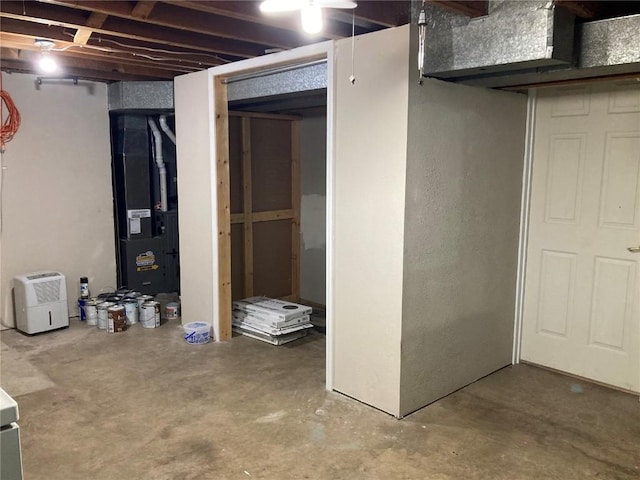 basement featuring heating unit