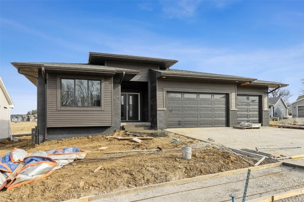 view of front of property with a garage