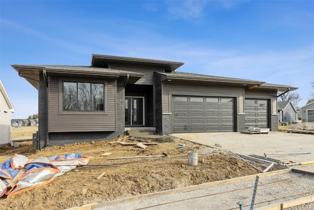 view of front of property with a garage