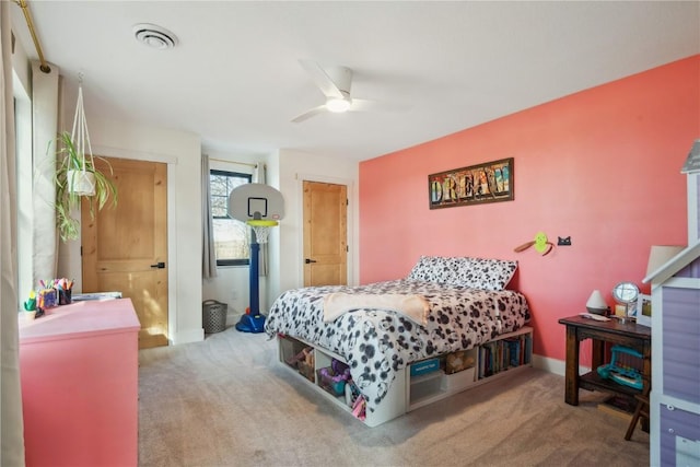 carpeted bedroom featuring ceiling fan