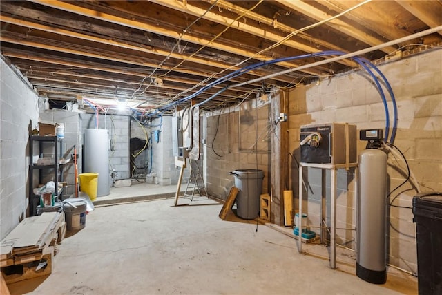 unfinished basement featuring water heater