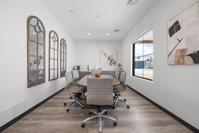 office space with hardwood / wood-style flooring