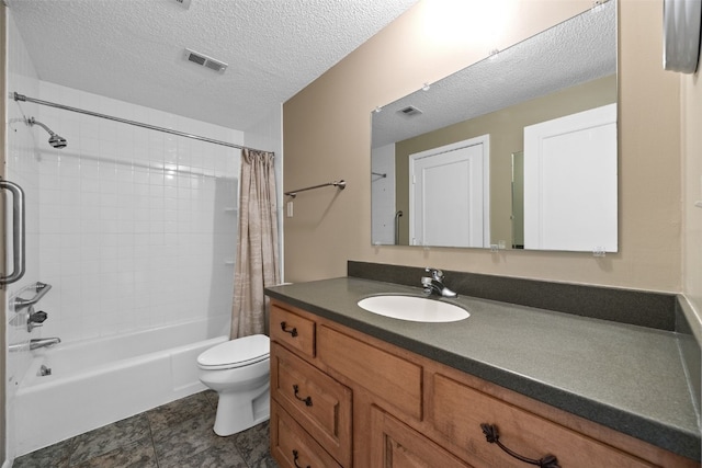 full bathroom featuring vanity, shower / bath combination with curtain, a textured ceiling, and toilet