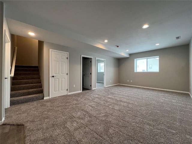 unfurnished room featuring carpet