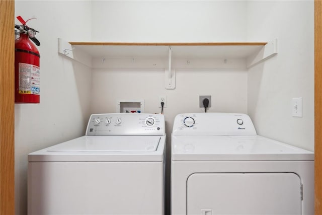 laundry room featuring washer and clothes dryer