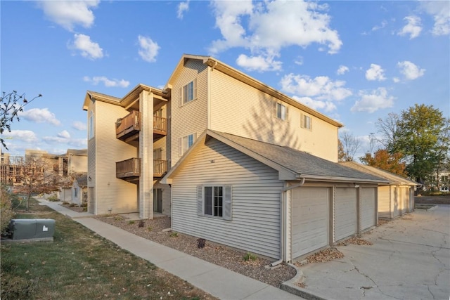 view of property exterior with a balcony