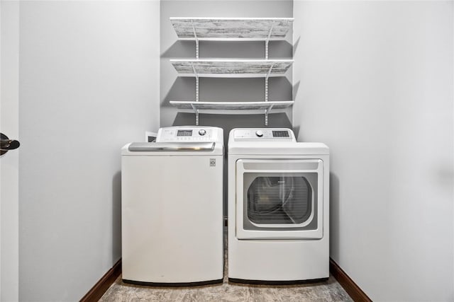 washroom featuring washer and dryer