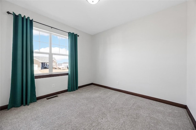 empty room with carpet floors