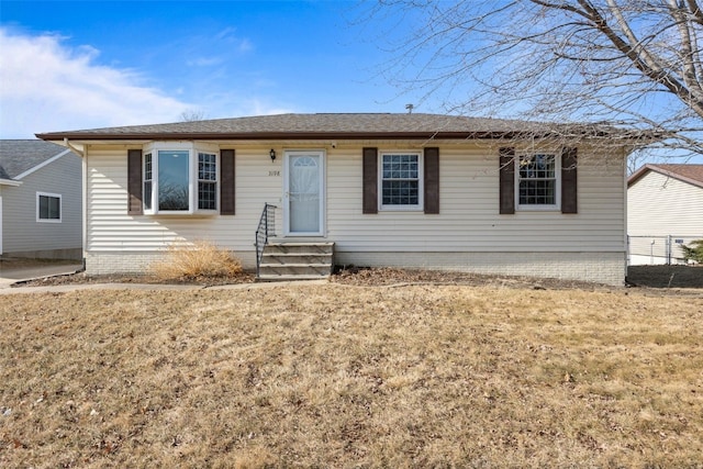 view of front of property with a front lawn