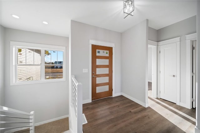 foyer featuring dark wood-type flooring