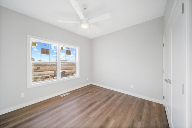 unfurnished bedroom featuring ceiling fan and wood-type flooring