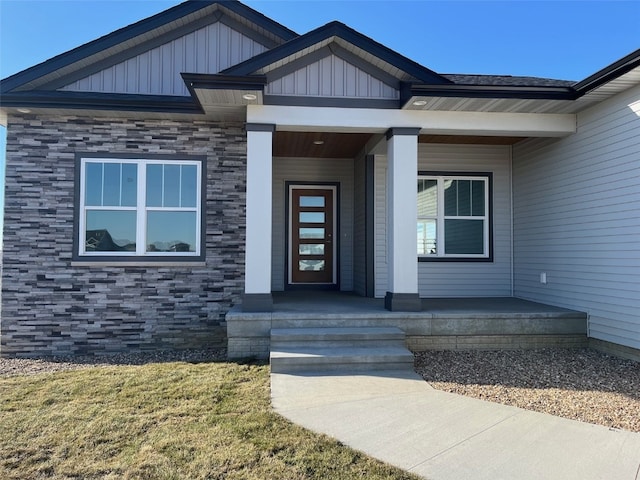 property entrance featuring covered porch