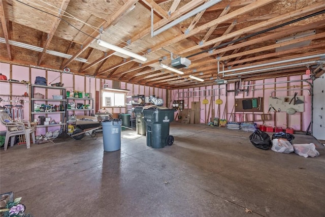 garage featuring a garage door opener