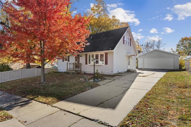 view of front of house with a garage and an outdoor structure