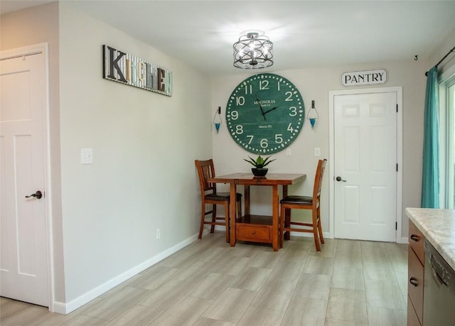 dining room with light hardwood / wood-style flooring