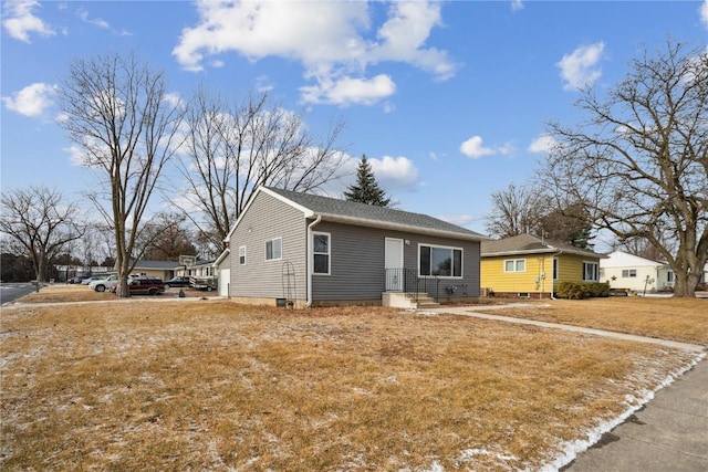 view of front of house with a front lawn