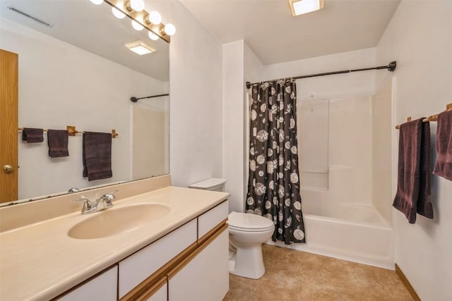 full bathroom with vanity, shower / bath combo, and toilet