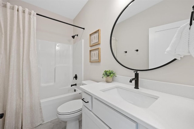 full bathroom with vanity, toilet, and shower / bath combo with shower curtain