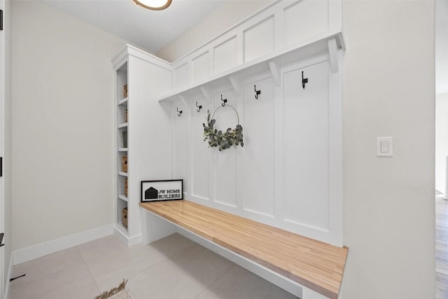 mudroom featuring light tile patterned floors