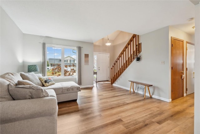 living room with light hardwood / wood-style floors