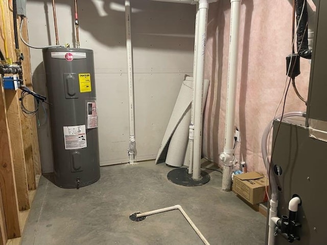 utility room featuring electric water heater