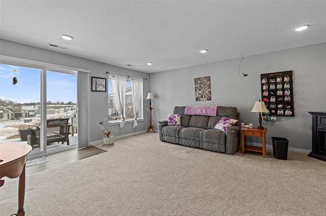 living room featuring light colored carpet