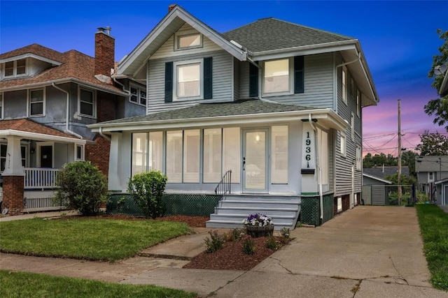 view of front of house with a lawn