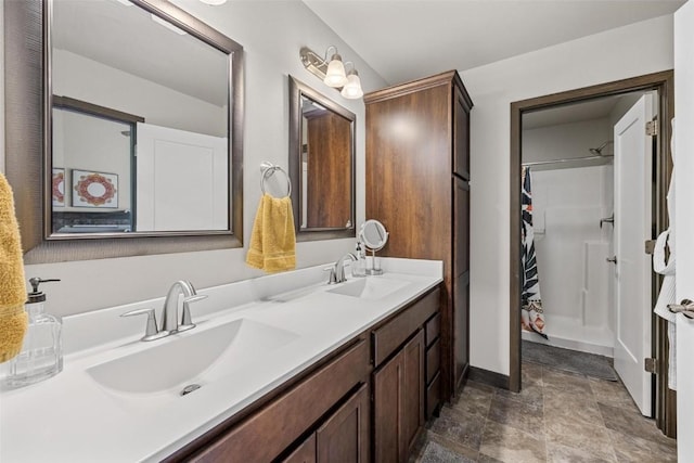 bathroom featuring vanity and walk in shower