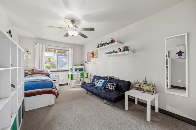 carpeted bedroom featuring ceiling fan