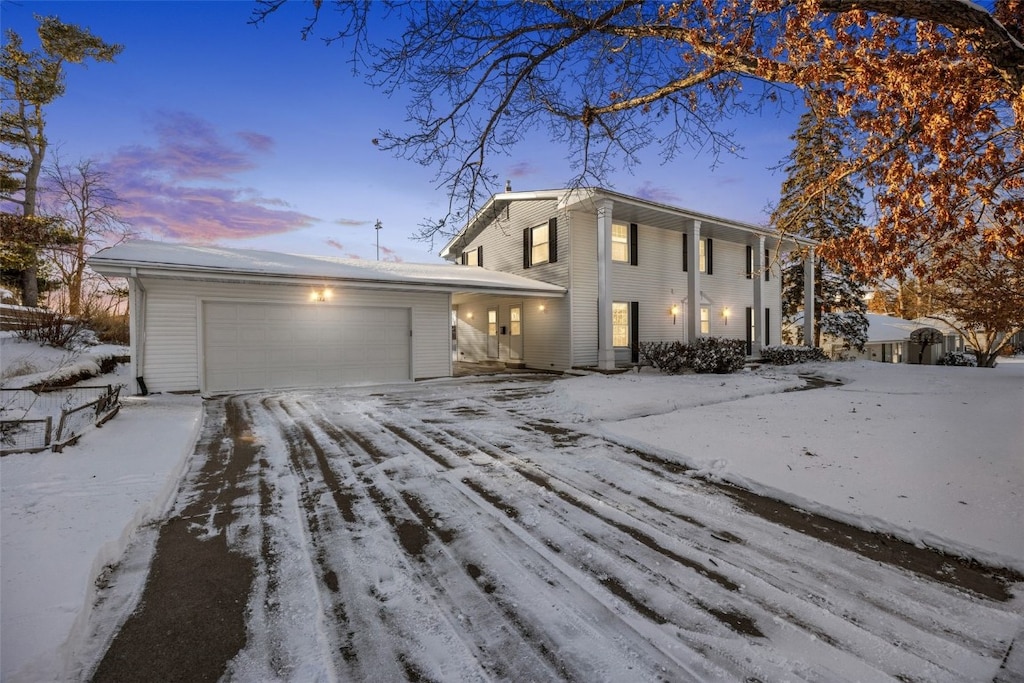 view of front of property with a garage