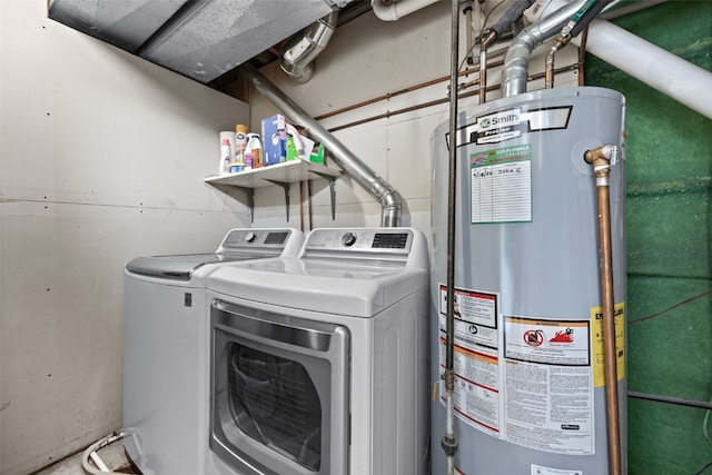 laundry room with separate washer and dryer and gas water heater