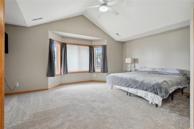 carpeted bedroom featuring lofted ceiling and ceiling fan