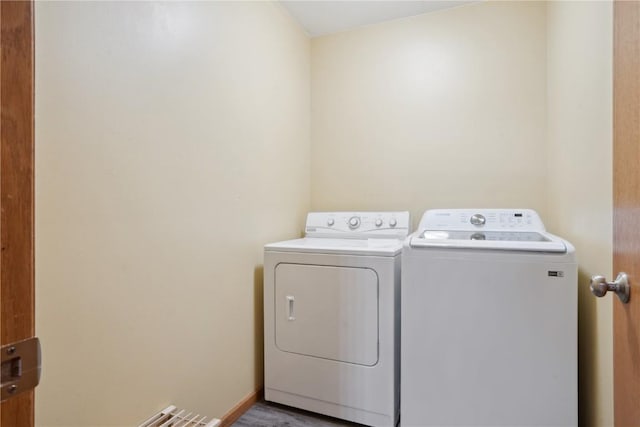 laundry area with separate washer and dryer