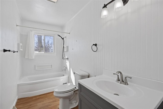 full bathroom with vanity, toilet, shower / bath combination, and hardwood / wood-style floors