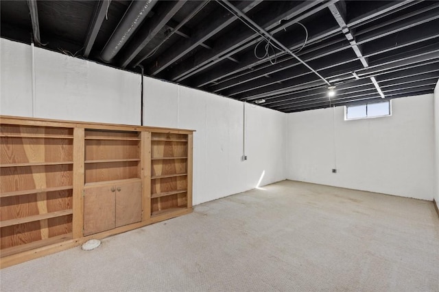 basement with light carpet