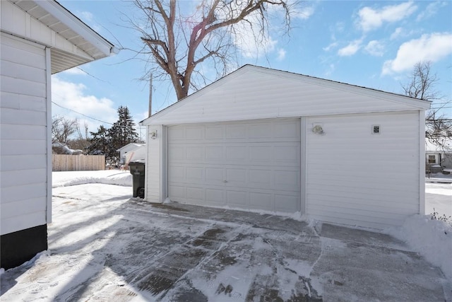 view of snow covered garage