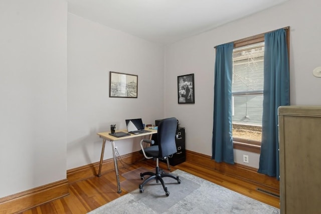 office space featuring hardwood / wood-style flooring and a wealth of natural light