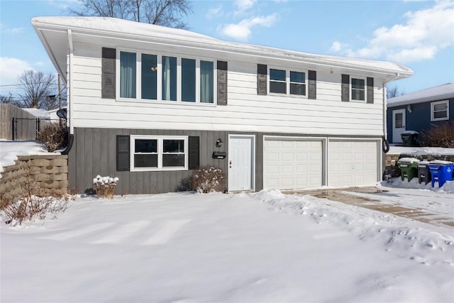 view of front of property featuring a garage