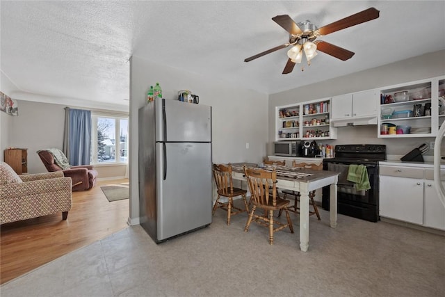 kitchen with white cabinetry, ceiling fan, stainless steel appliances, and a textured ceiling