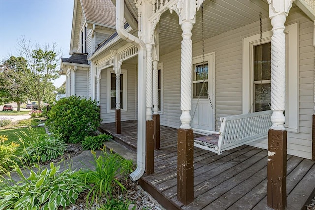 wooden terrace featuring a porch