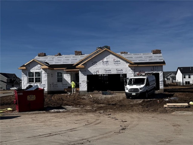 property in mid-construction featuring an attached garage