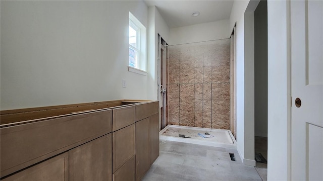 bathroom with a stall shower