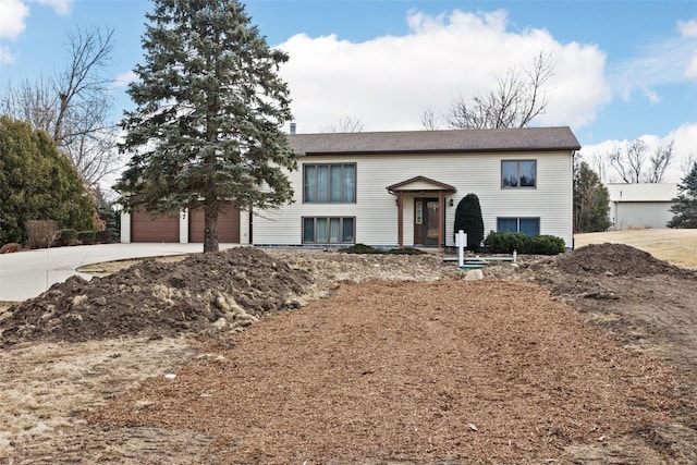 bi-level home featuring a garage