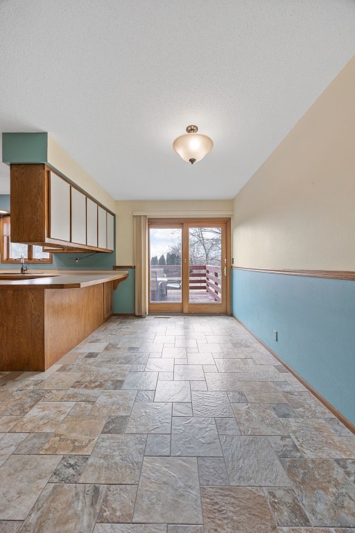 kitchen with a textured ceiling